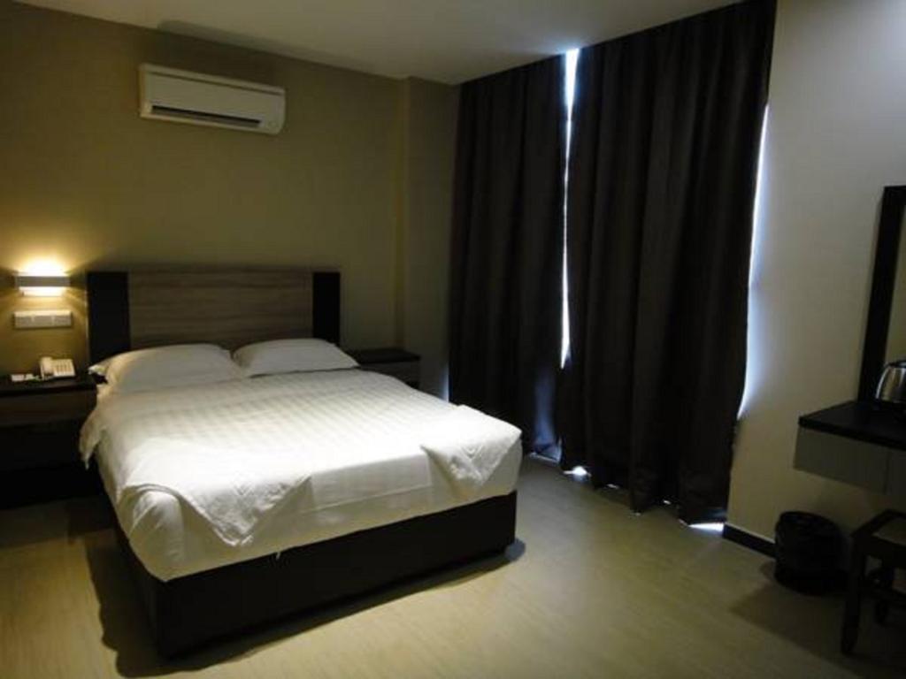Galaxy Hotel Simpang Ampat  Pokoj fotografie