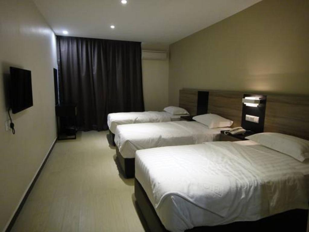 Galaxy Hotel Simpang Ampat  Pokoj fotografie
