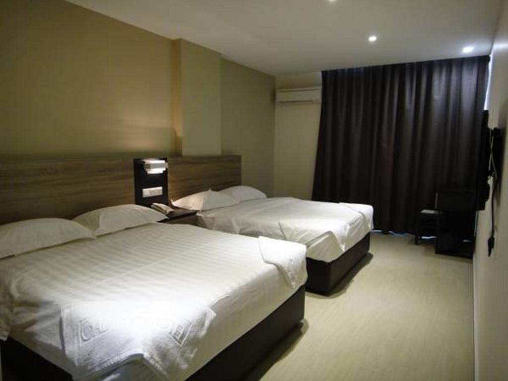 Galaxy Hotel Simpang Ampat  Pokoj fotografie